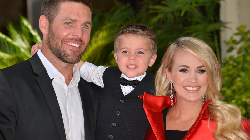 Carrie Underwood and husband Mike Fisher and son